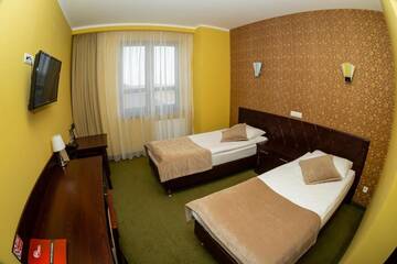 Фото номера Двухместный номер с 1 кроватью или 2 отдельными кроватями Отель Hotel Szyszko г. Сувалки 7