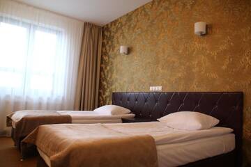 Фото номера Двухместный номер с 1 кроватью или 2 отдельными кроватями Отель Hotel Szyszko г. Сувалки 12