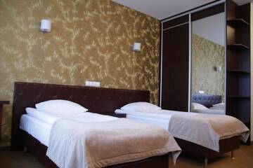 Фото номера Трехместный номер Отель Hotel Szyszko г. Сувалки 3