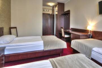 Фото номера Трехместный номер Отель Hotel Szyszko г. Сувалки 4