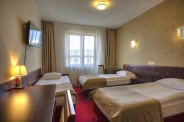 Фото номера Трехместный номер Отель Hotel Szyszko г. Сувалки 5