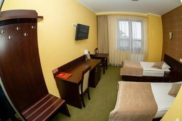 Фото номера Двухместный номер с 1 кроватью или 2 отдельными кроватями Отель Hotel Szyszko г. Сувалки 3
