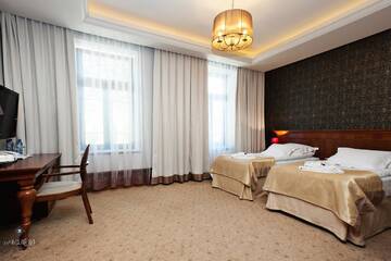 Фото номера Двухместный номер с 2 отдельными кроватями Отель Hotel Akvilon г. Сувалки 5